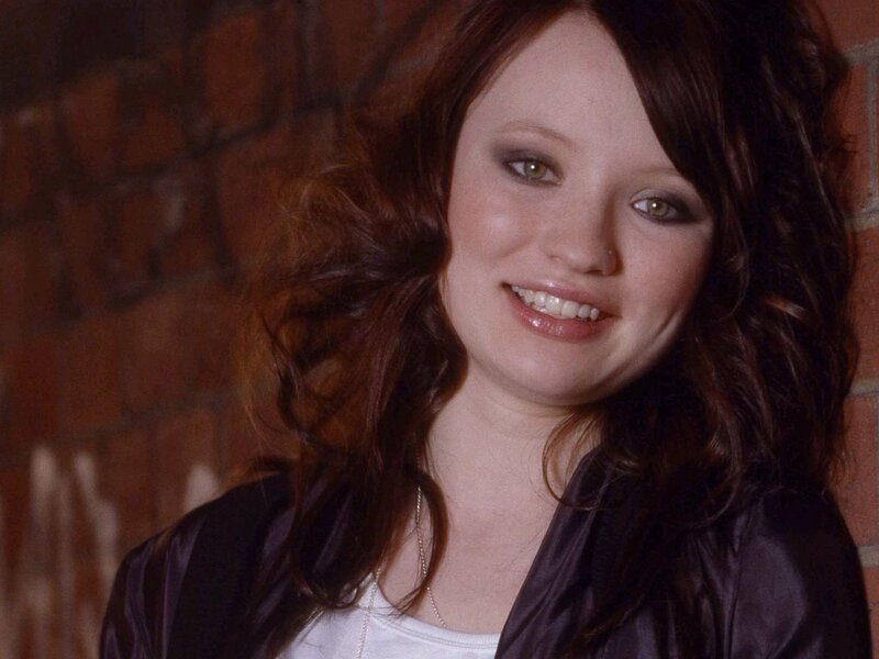 Woman with Brown Hair — Smiling, Photograph, Brick Wall, Jacket