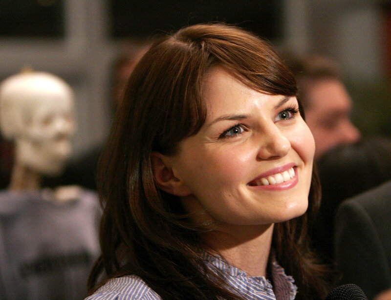 Woman with Brown Hair — Smiling, Photograph, Microphone, Skeleton Model