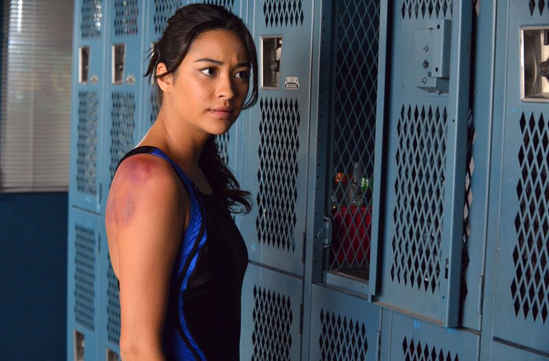 woman with bruise in locker room