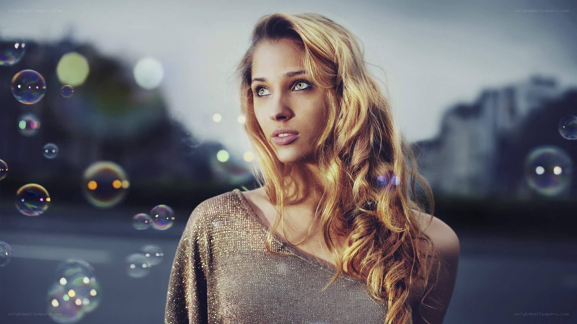 woman with bubbles in city