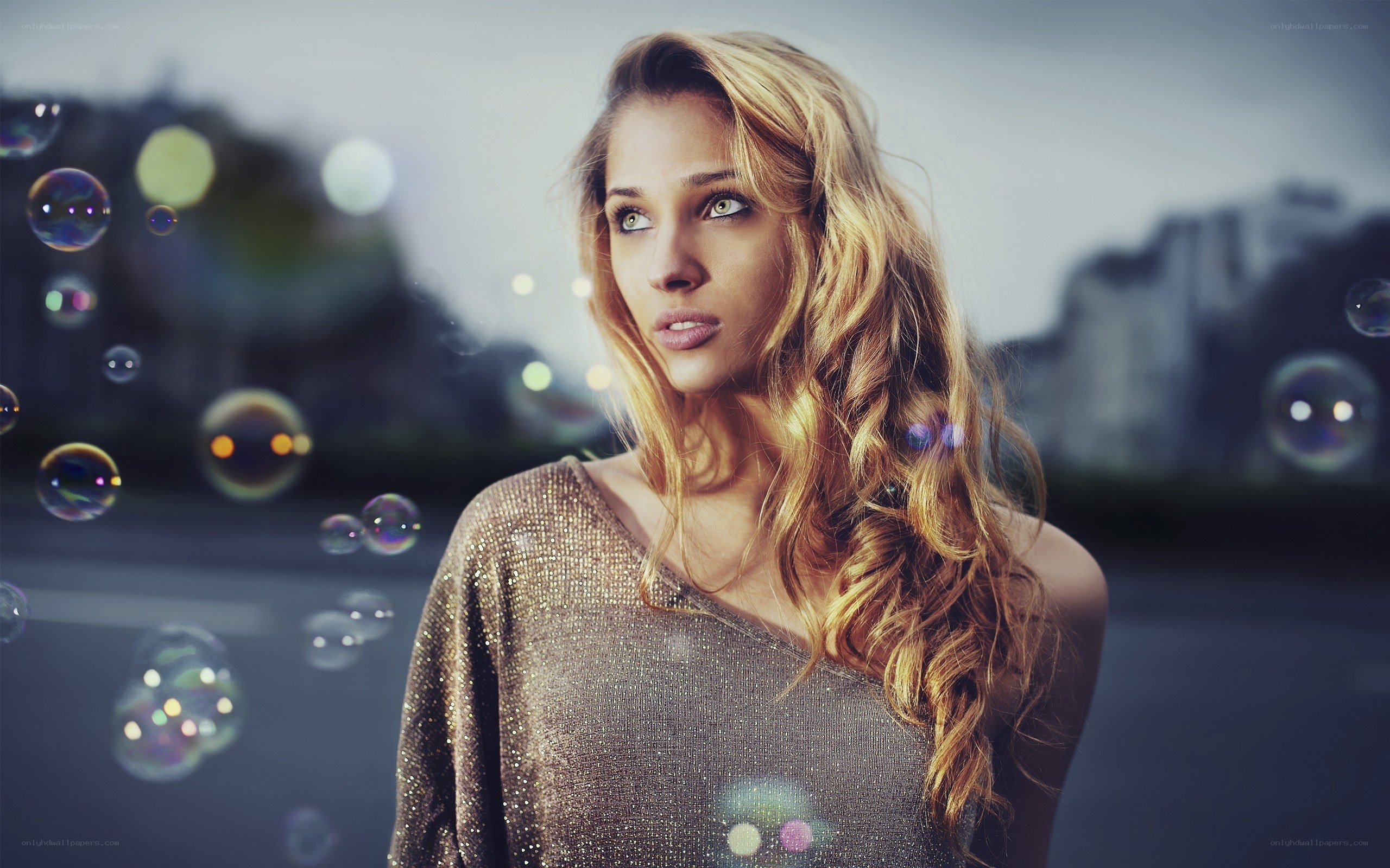 woman with bubbles in city