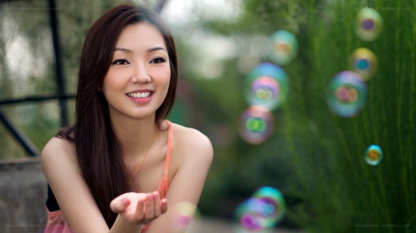 woman with bubbles in garden