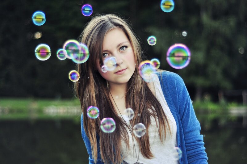 woman with bubbles in park
