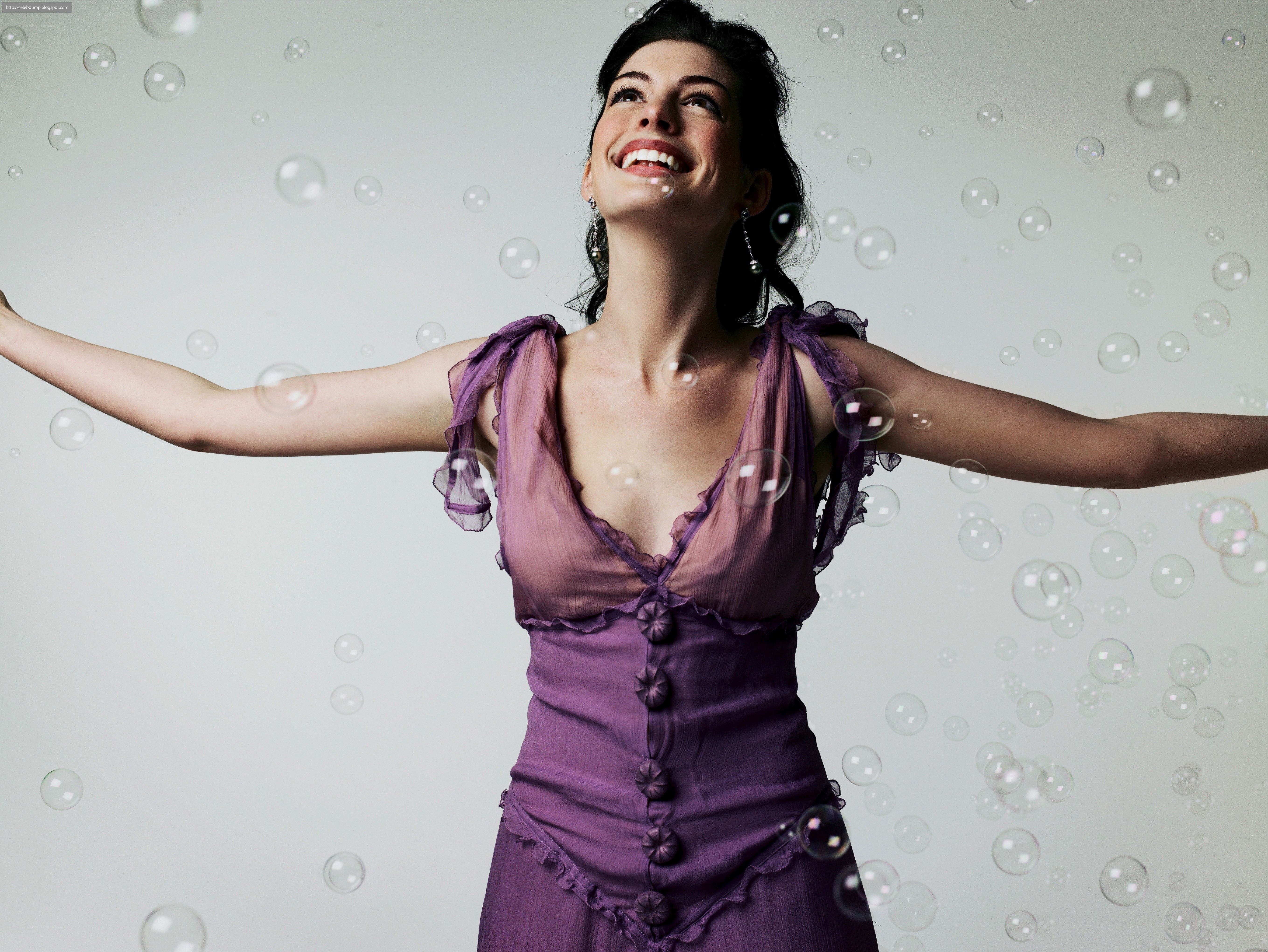 woman with bubbles smiling