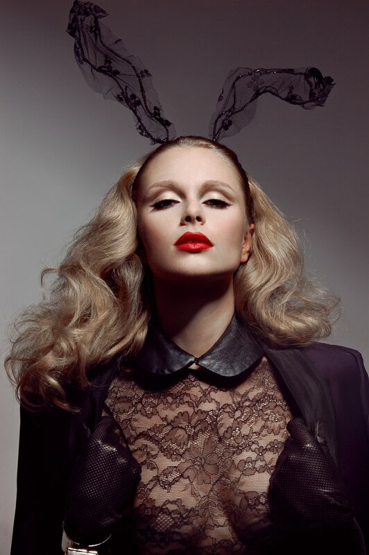 woman with bunny ears and red lipstick