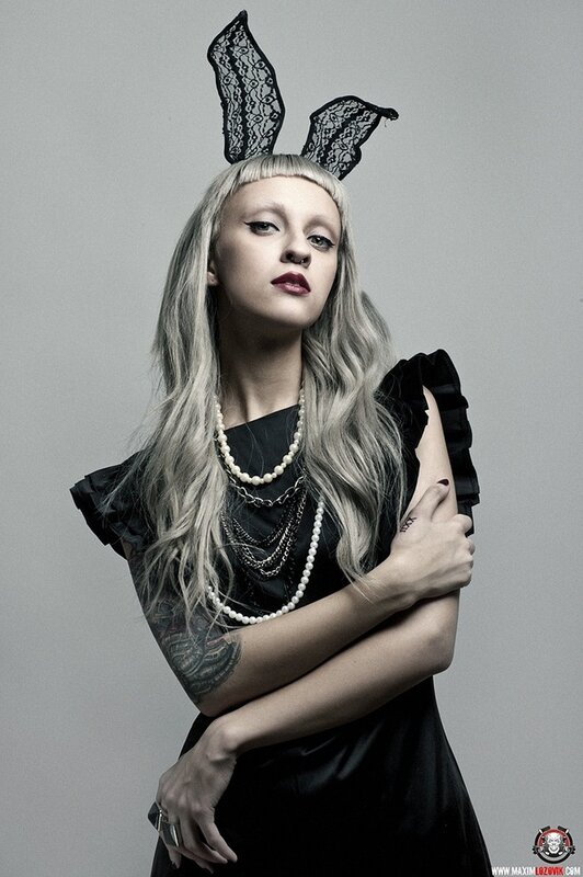 woman with bunny ears and tattoos