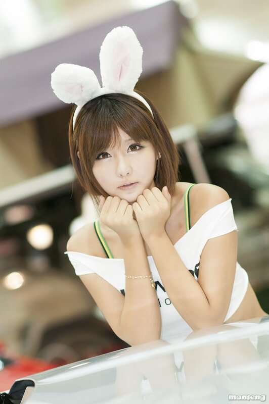 woman with bunny ears at event