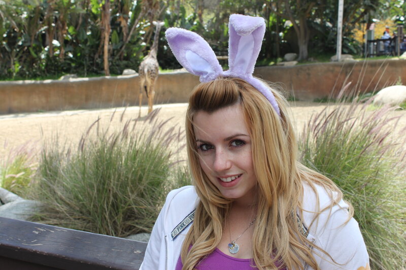 Woman with bunny ears at zoo