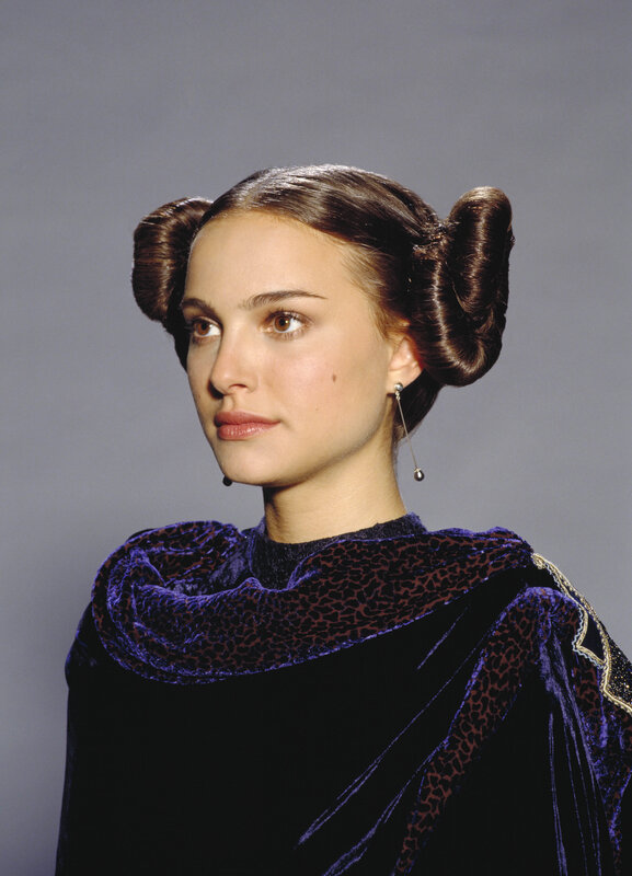 Woman with Buns Hairstyle — Purple