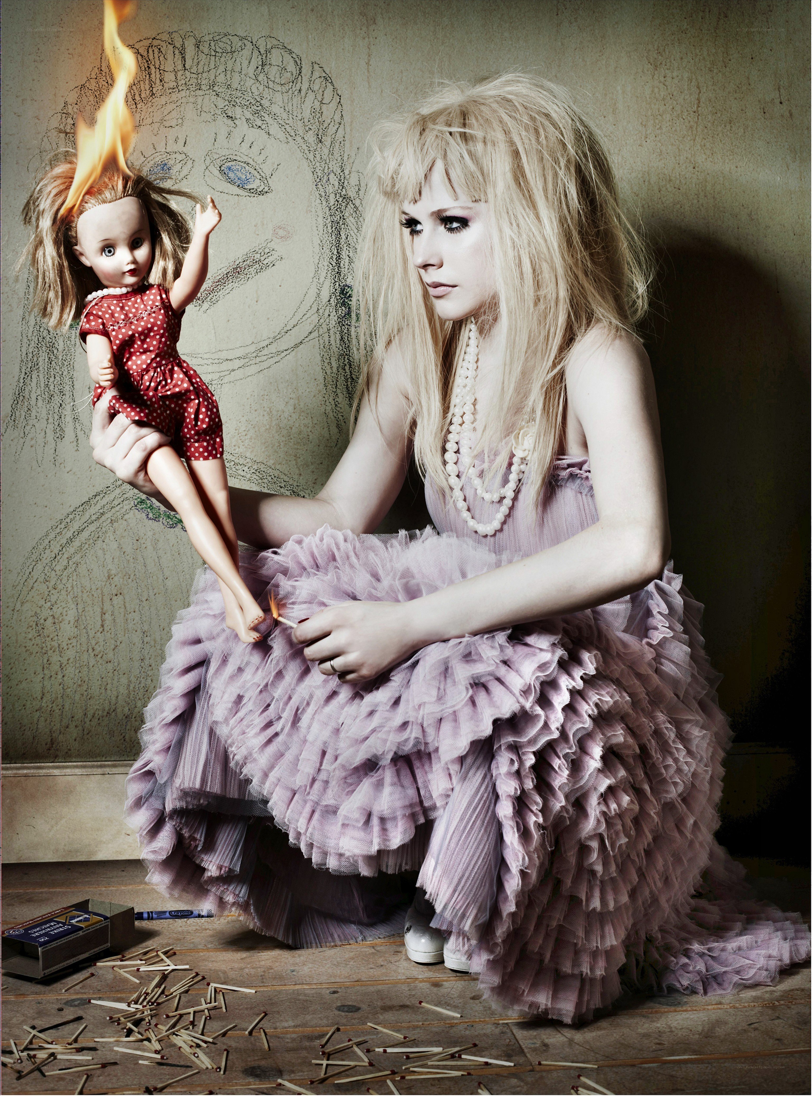 Woman with burning doll