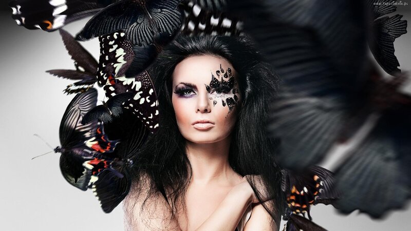 woman with butterflies and makeup