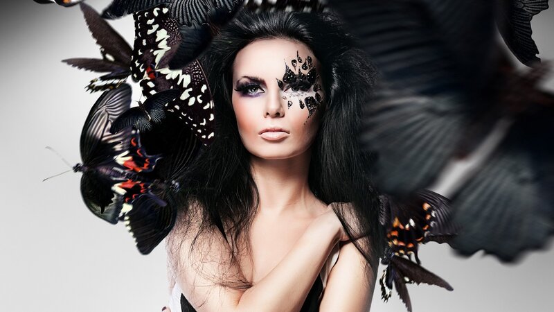 woman with butterflies and makeup