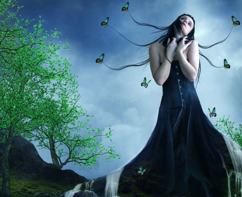 woman with butterflies in nature