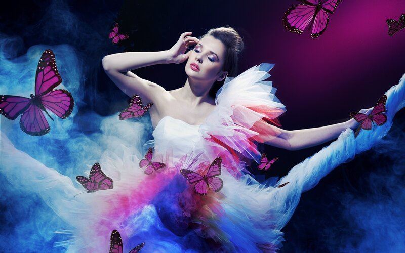 woman with butterflies in smoke