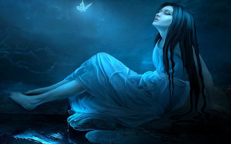 woman with butterfly at night