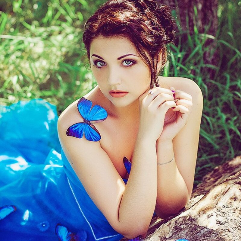 Woman with Butterfly — Blue, Serene, Afternoon, Photograph