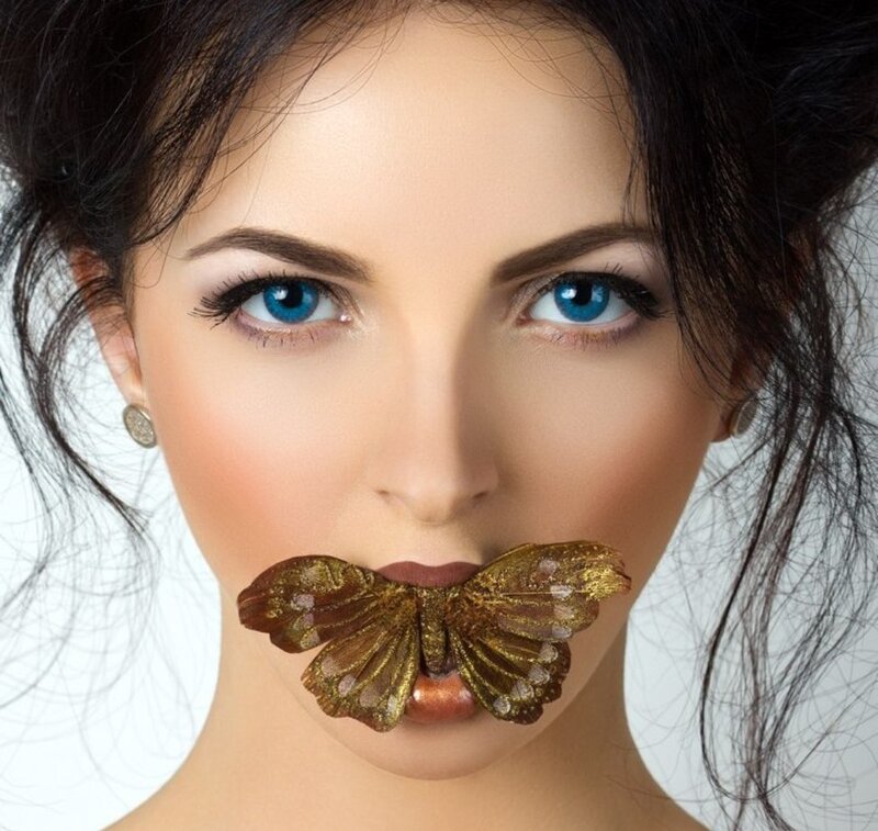 Woman with Butterfly — Brown, Dramatic, Photograph, Blue Eyes