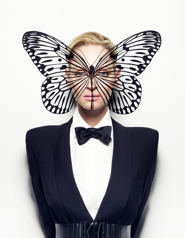 woman with butterfly face art