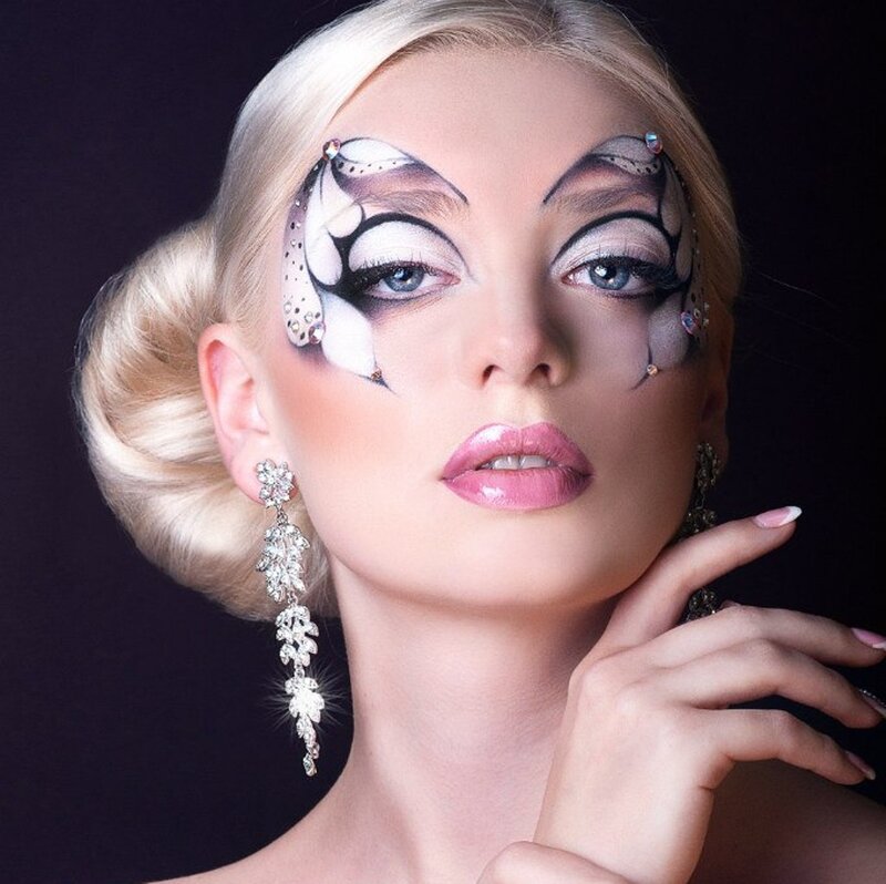 Woman with Butterfly Makeup — Black, Dramatic, Photograph
