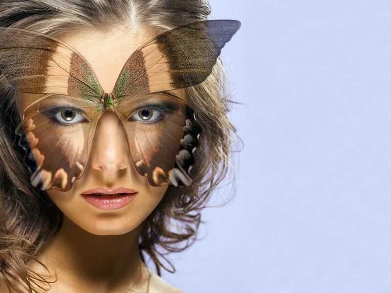 woman with butterfly mask