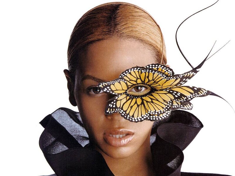 woman with butterfly mask