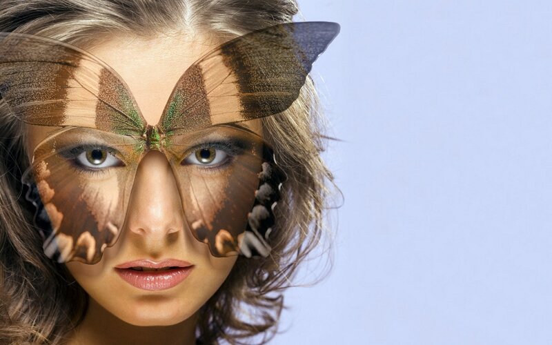woman with butterfly mask