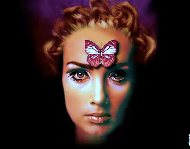 woman with butterfly on forehead