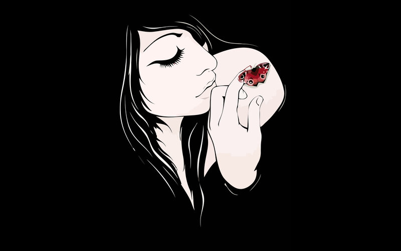 woman with butterfly on hand