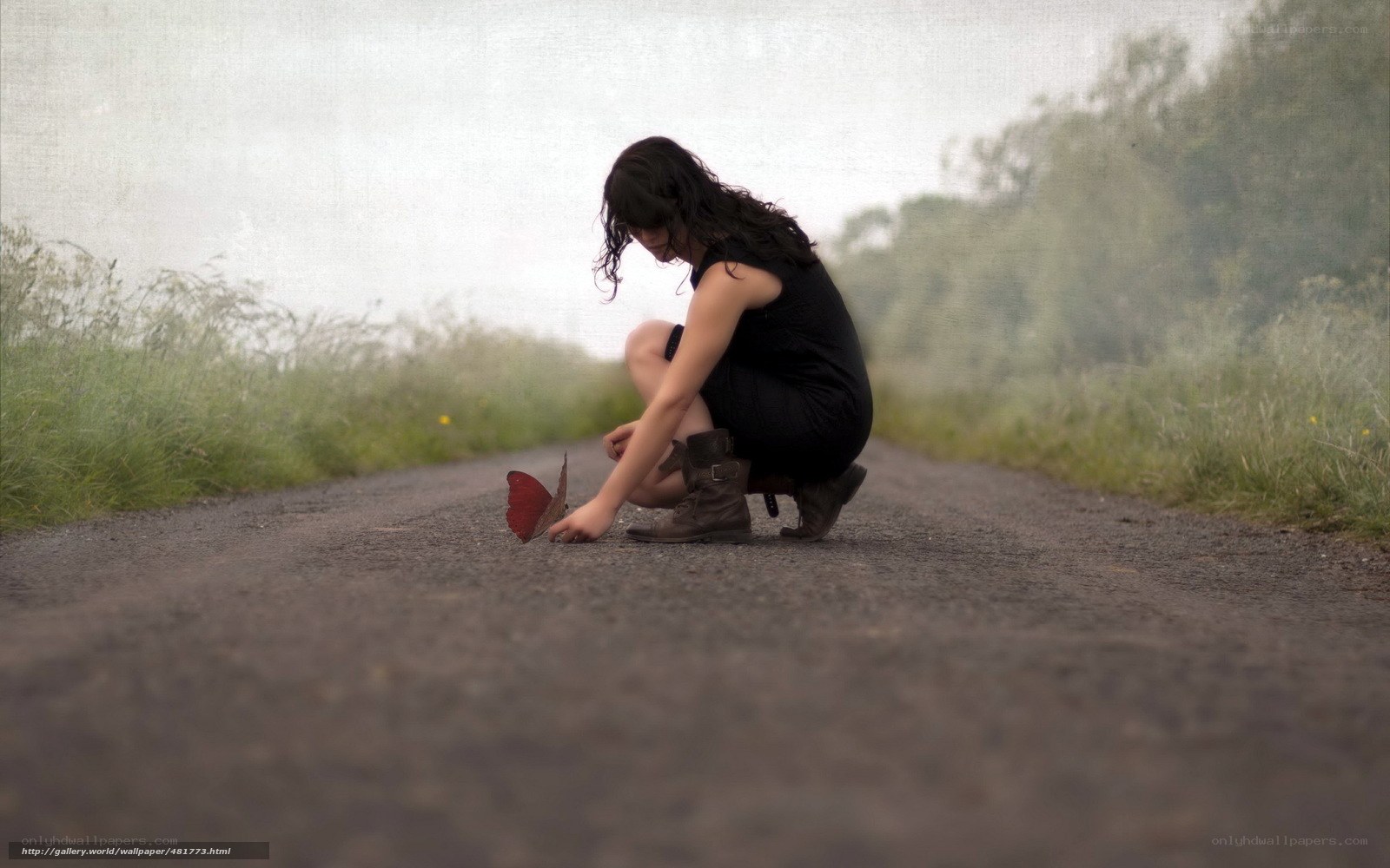 woman with butterfly on road