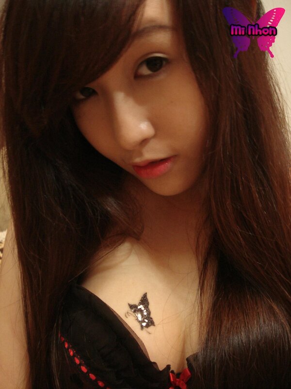 woman with butterfly tattoo