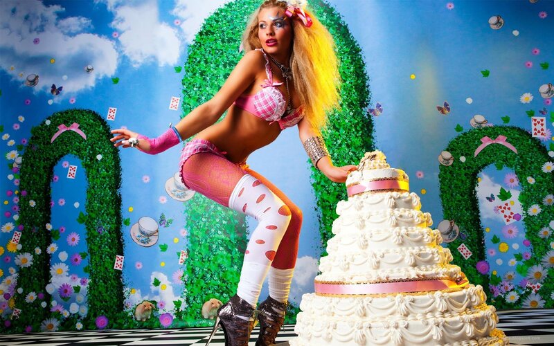 woman with cake in garden