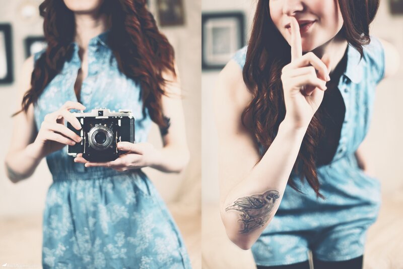 Woman with camera and tattoo