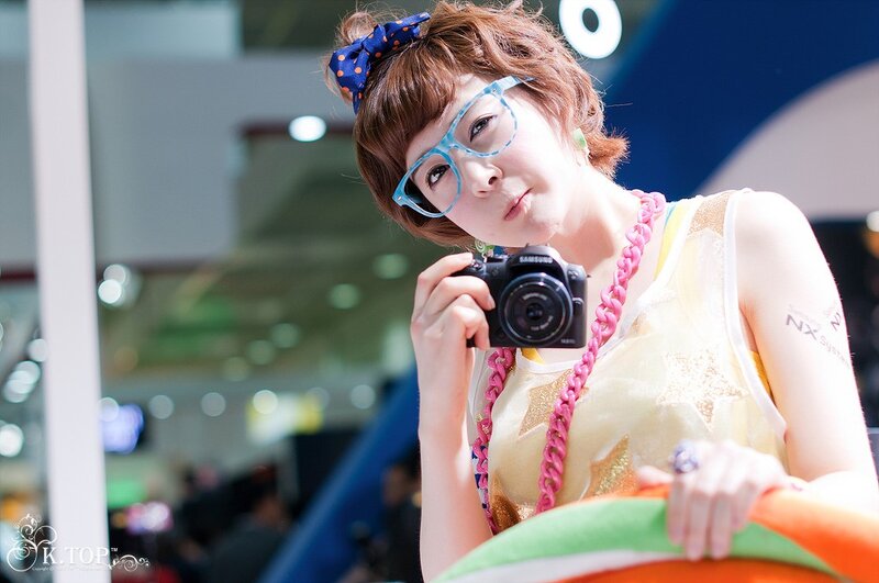 woman with camera at event