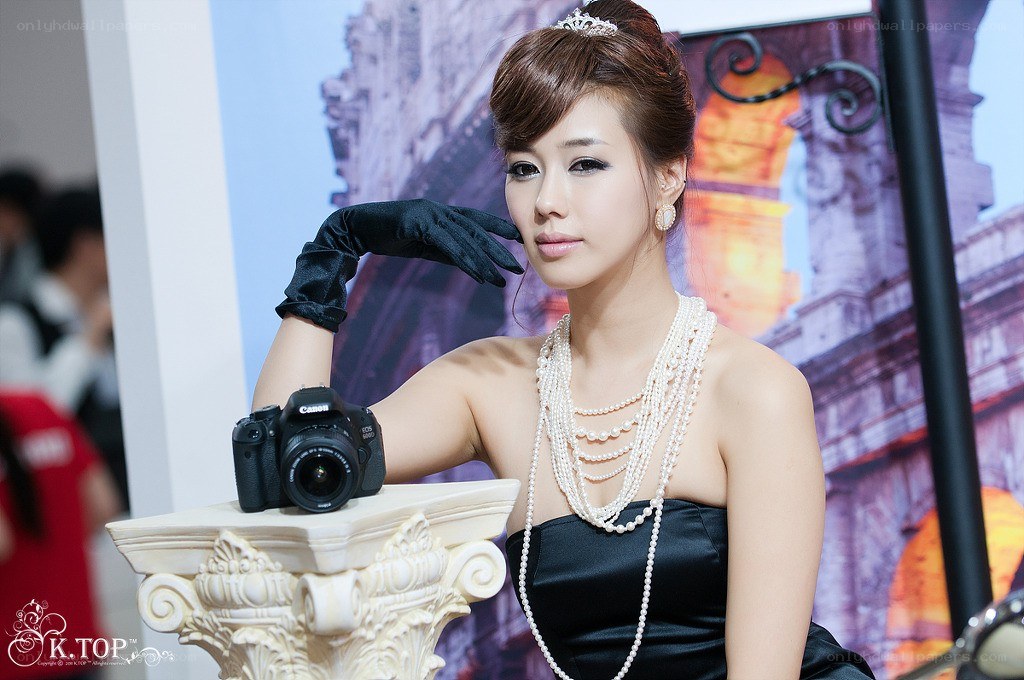 woman with camera at event