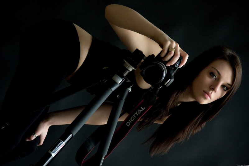 Woman with Camera — Black, Dramatic, Photograph, Tripod