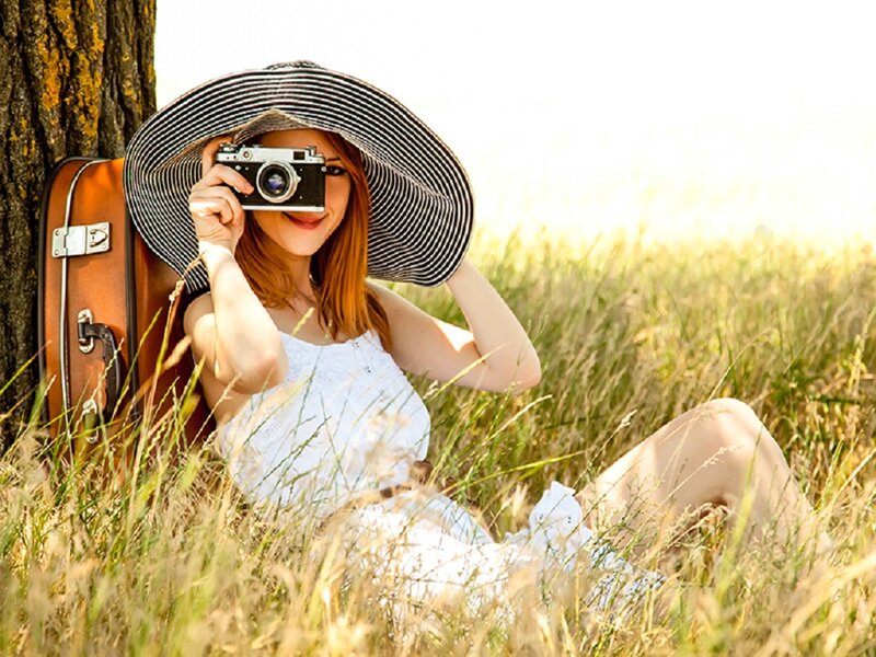 Woman with Camera in Field — White