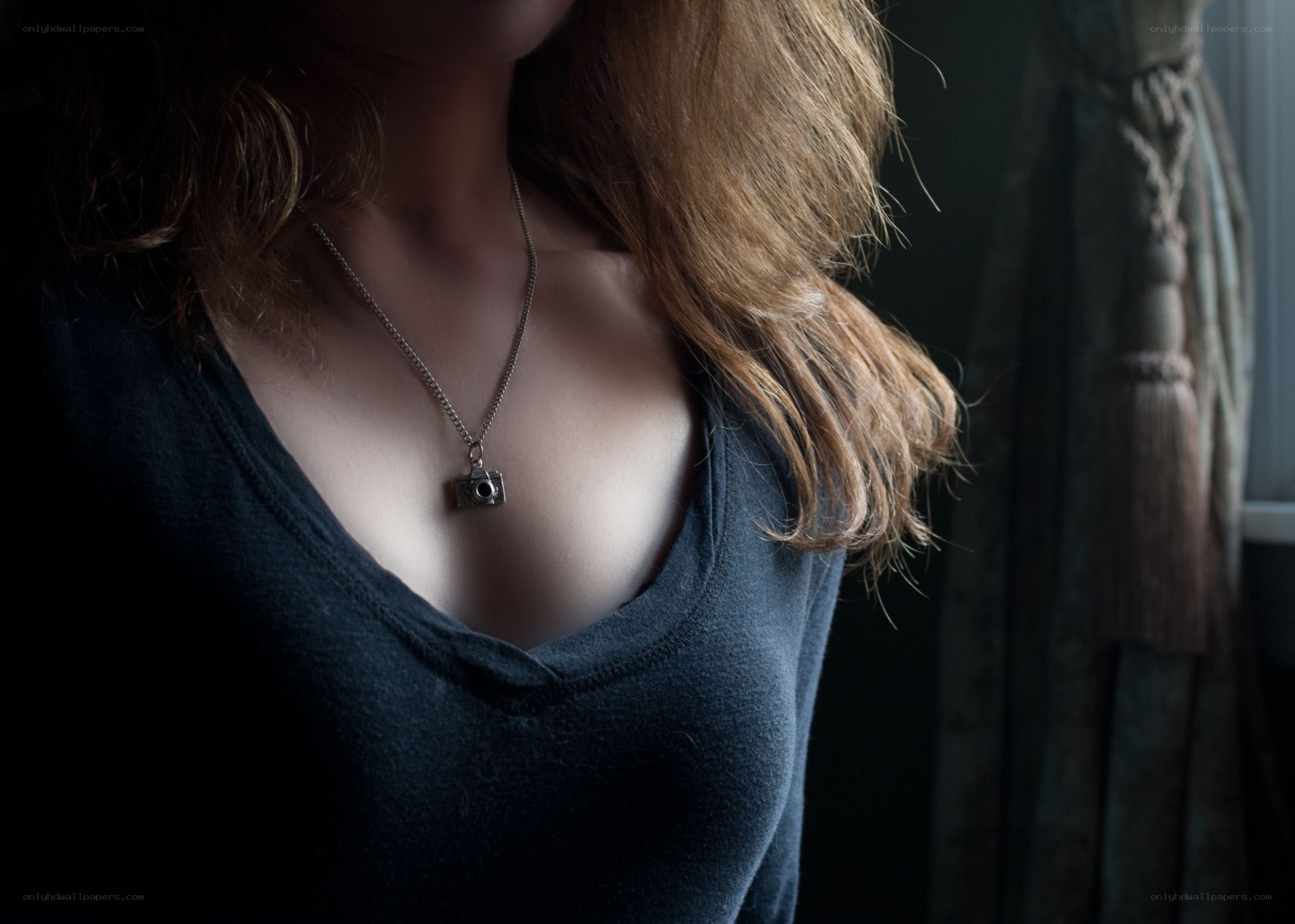 woman with camera necklace