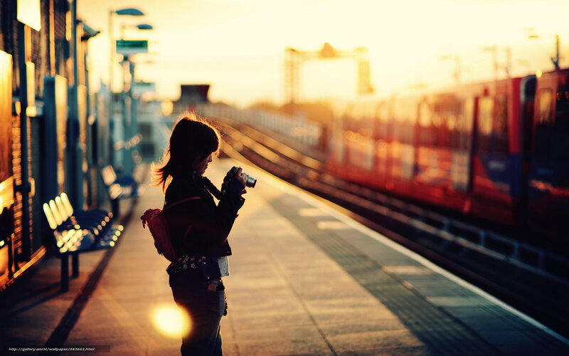 Woman with Camera on Platform