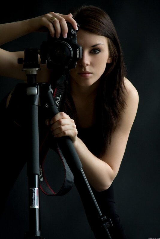 woman with camera on tripod