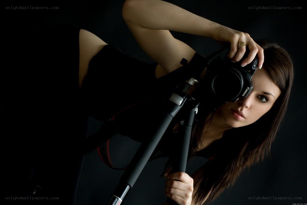 woman with camera on tripod
