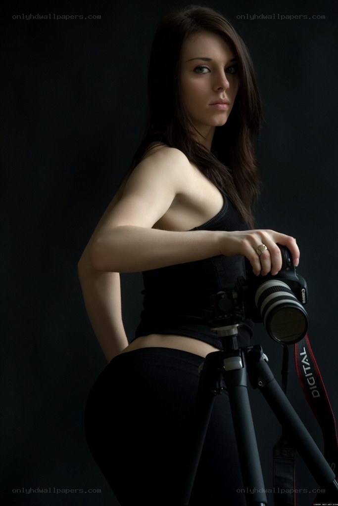 woman with camera on tripod
