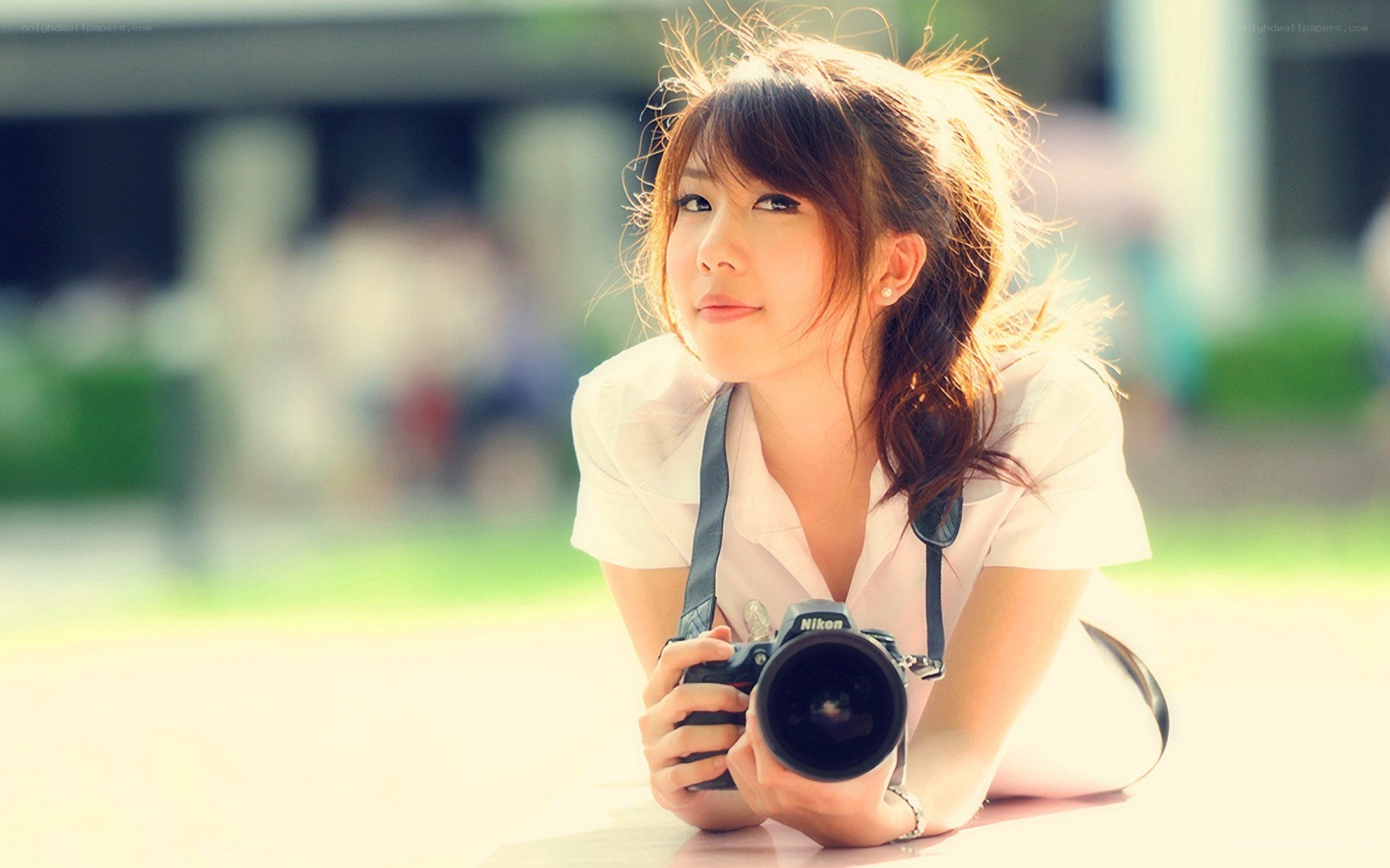 woman with camera outdoors