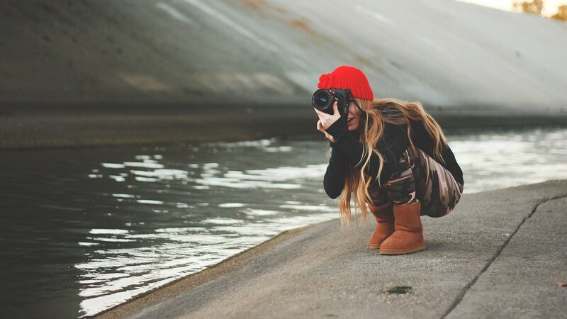 Woman with Camera — Red, Calm