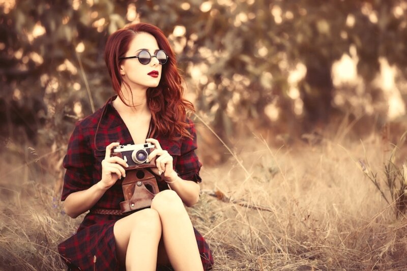 Woman with Camera — Red, Serene