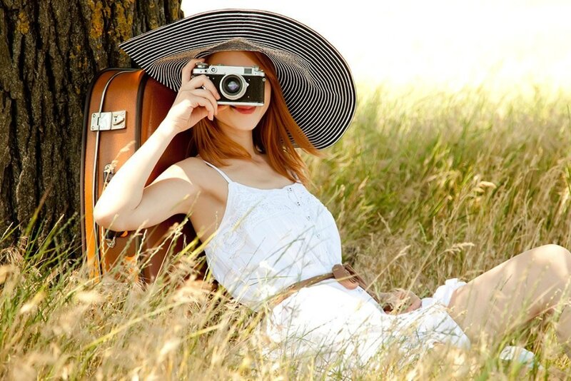 Woman with Camera — White, Serene, Afternoon