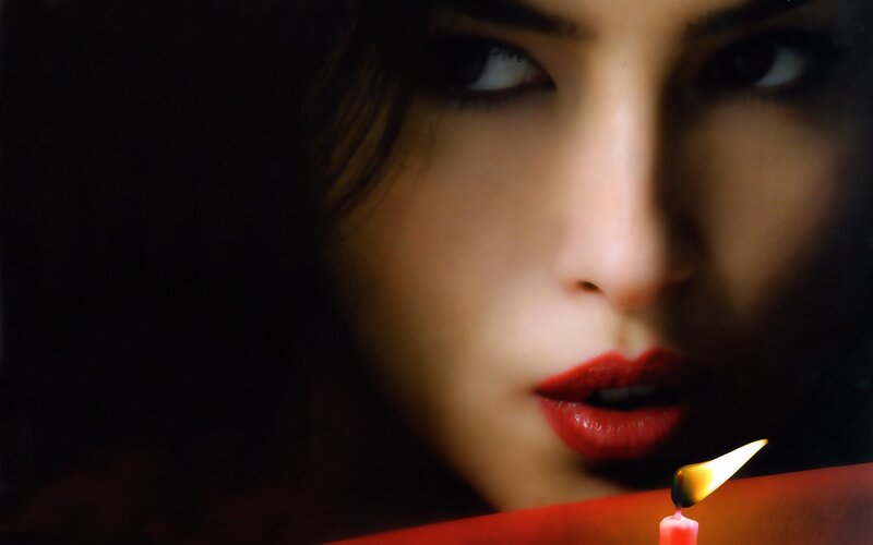 woman with candle close-up