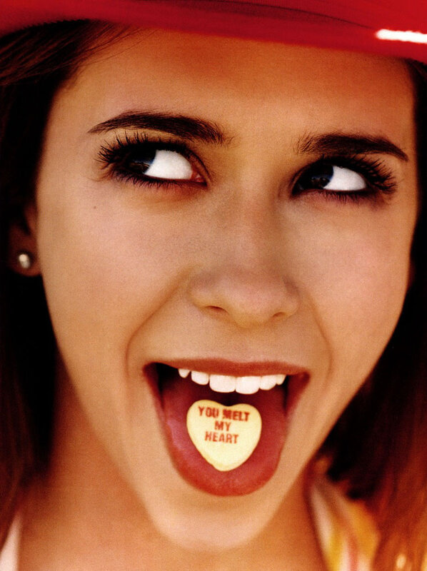 woman with candy in mouth