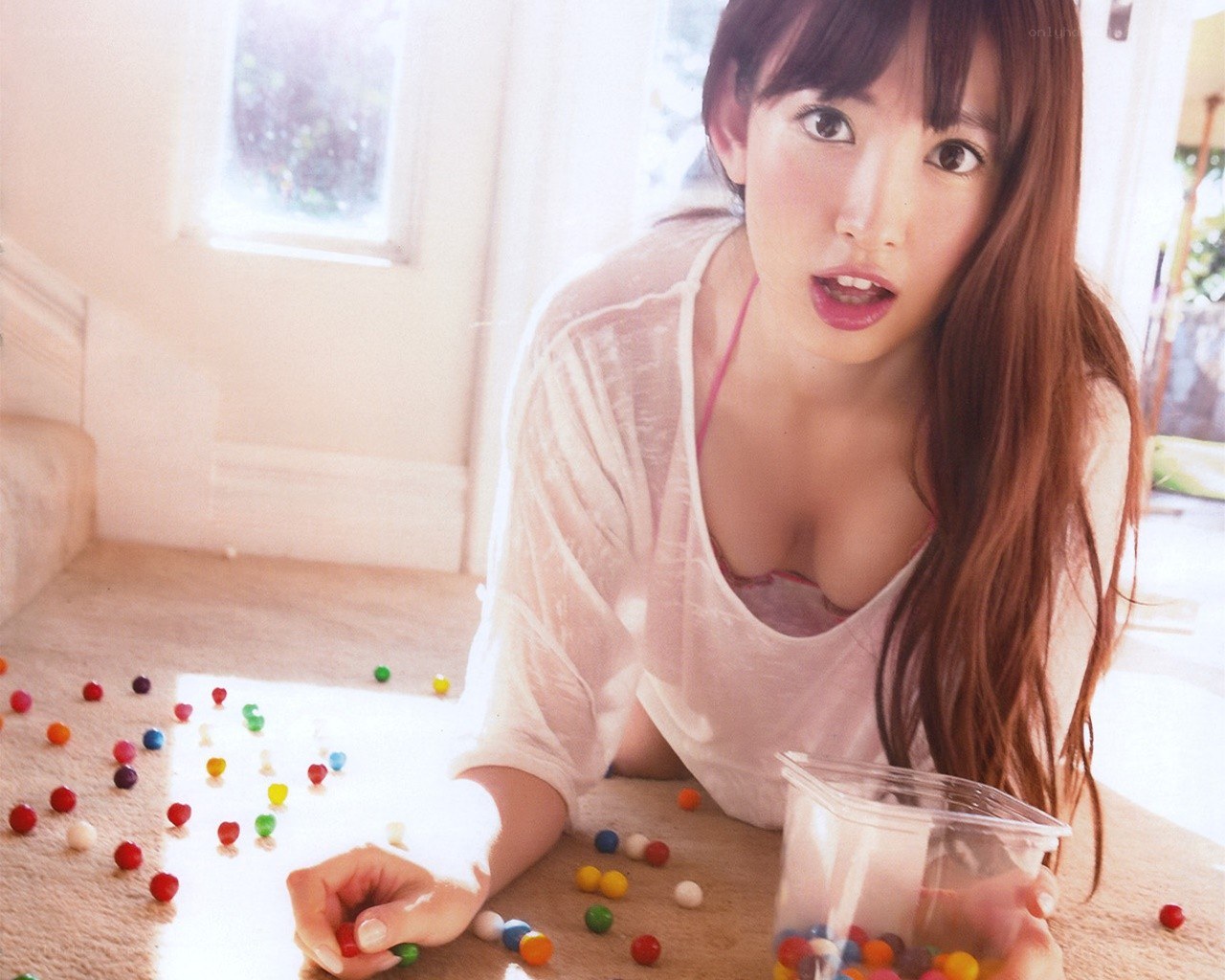 woman with candy on floor