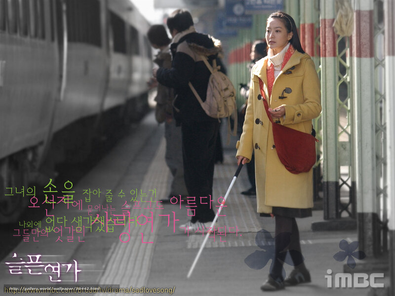 Woman with Cane on Platform