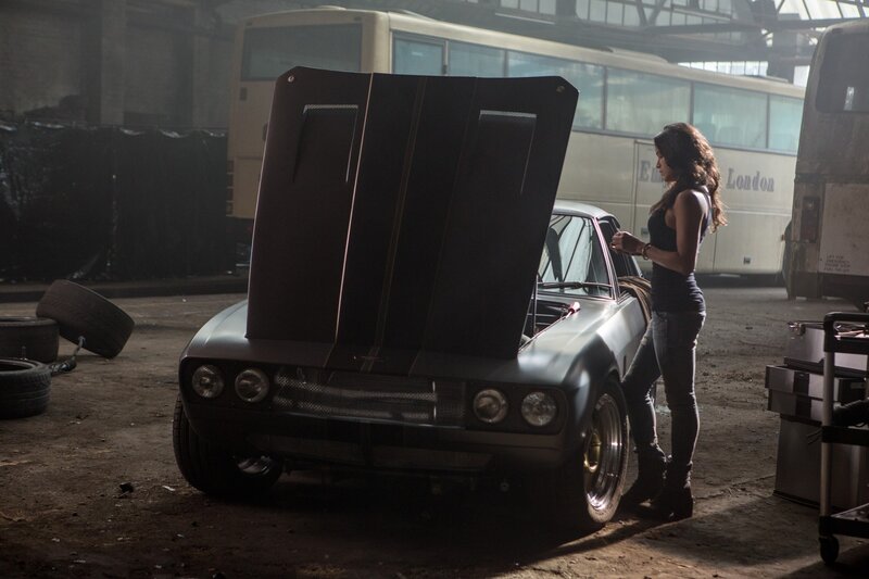 woman with car in garage